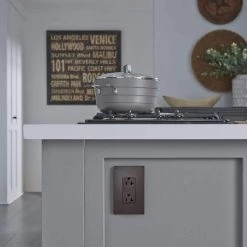 Radiant 20 Amp 125-Volt Spec Grade Tamper Resistant Heavy-Duty Decorator Duplex Outlet, Dark Bronze by Legrand -Legrand Sales dark bronze legrand electrical outlets receptacles tr26352rdbcc6 66 1000