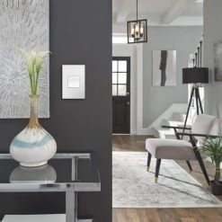 Adorne Paddle 15 Amp Single Pole/3-Way Decorator Switch with Wall Plate, White by Legrand -Legrand Sales white legrand light switches aspd1532w4wp 66 1000